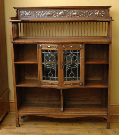 Oak Bookcase with repoussé copper panel